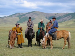 Mongolian horse men (c) Mark Johnstad